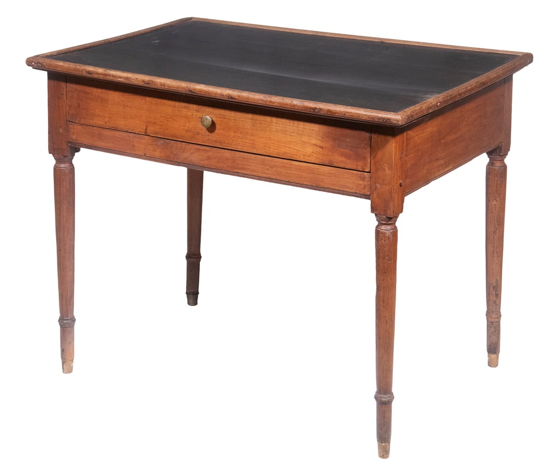 SMALL LEATHERTOP DESK, LATE 19TH C.: American walnut, with molded edge top having an inset dark brown tooled leather top, single drawer on long side with brass knob and pine secondary, ring turned legs, 27 1/2" x 35 1/2" x 25 1/2", minor