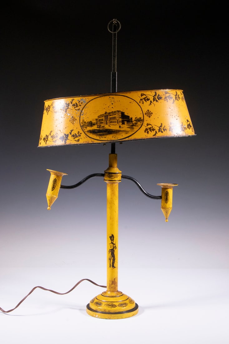 FRENCH TOLE PAINTED TABLE LAMP: Yellow Painted Tin Two-Arm Bouillotte Style Lamp, with two candle sockets and oval shade concealing a two socket electric light fixture with chain pulls, 30" high, 16" x 10".