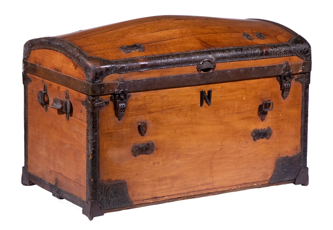 NATHAN NEAT & CO. PINE DOME TOP TRUNK: Mid-19th c. Leather and Iron Mounted Chest, by Nathan Neat & Co. of Boston, with brass tack trimmed leather edging, remnants of leather side handles, wallpaper lined interior, lid interior with affixe
