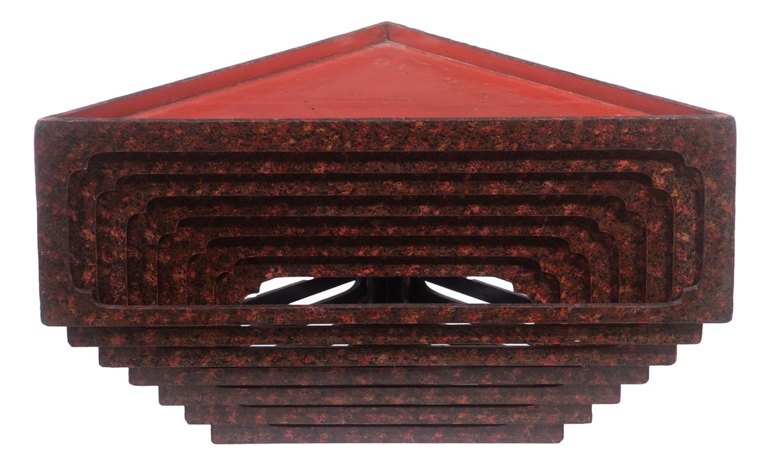 STACK OF (7) TRIANGULAR JAPANESE LACQUERED TABLES: Inverted nesting tables in maki lacquered gold and red on black slat frames, having recessed flame red graduated tops, 9" x 11 1/2" x 16" to 9 12"1/2" x 30".