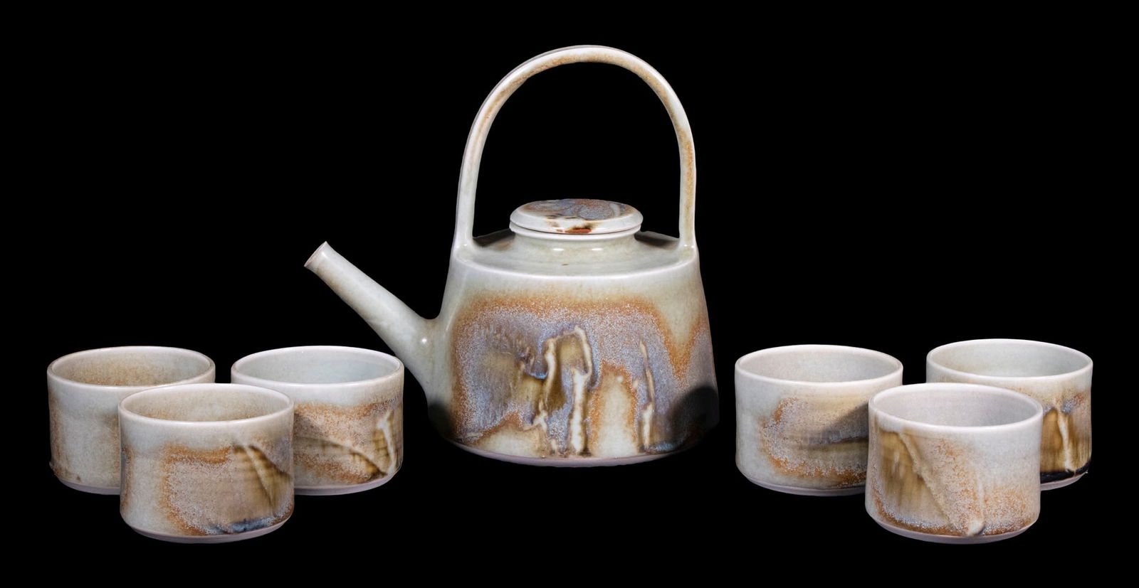 BROTHER THOMAS BEZANSON (CANADA/VT, 1929-2007): (7) Piece Porcelain Teapot & Cups Set, in iron rutile glaze, ca. 1970s, signed on base with artist's cipher and "Benedictine Monks", Weston, Vermont", crafted while Brother Thomas was a member of the