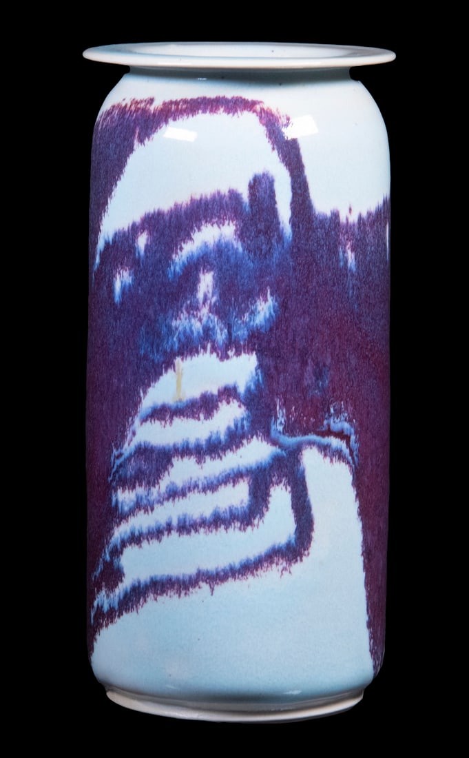 BROTHER THOMAS BEZANSON (CANADA/VT, 1929-2007): Cylindrical Vase with flared rim, in copper purple and red over celadon glaze, ca. 1980, signed on base with artist's cipher and "Benedictine Monks", Weston, Vermont", crafted while Brother Thomas was