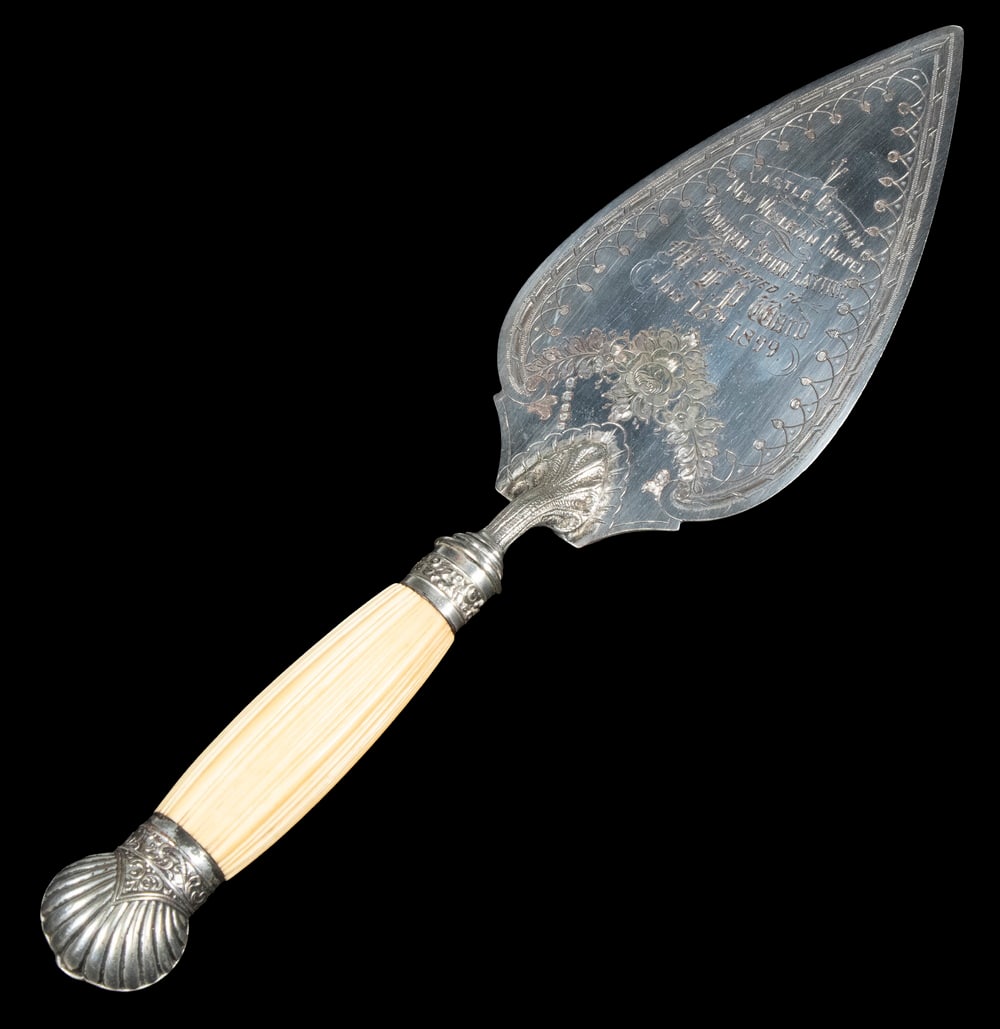 ENGLISH SILVER-PLATE TROWEL WITH CHAPEL PRESENTATION: Late 19th c. Engraved Trowel, by Birmingham maker Daniel & Arter, commemorating the memorial stone laying for the new Wesleyan chapel in Castle Bytham, Lincolnshire, England on July 13, 1899, presente