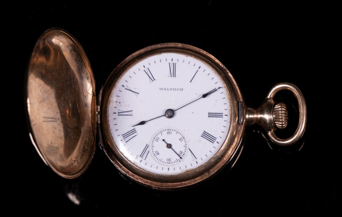 14K GOLD WALTHAM PENDANT WATCH: Hunter Case Watch, 0 size, sn 16648308, No. 161, model 1907, 7-jewels, white enamel face with subsidiary seconds dial, fancy engraved yellow gold case by Courvoisier & Wilcox Mfg. Co., 1 1/8" diam. fa