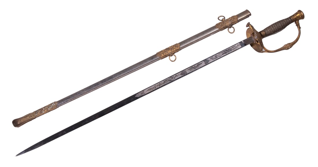 US ARMY M1860 PRESENTATION SWORD: Staff and Field Officers Sword, Peterson #121. Standard pattern carried by Union sergeants in the Civil War. Brass hilt with eagle pommel and guard. Floral motif knuckle bow. Spirally fluted leather c