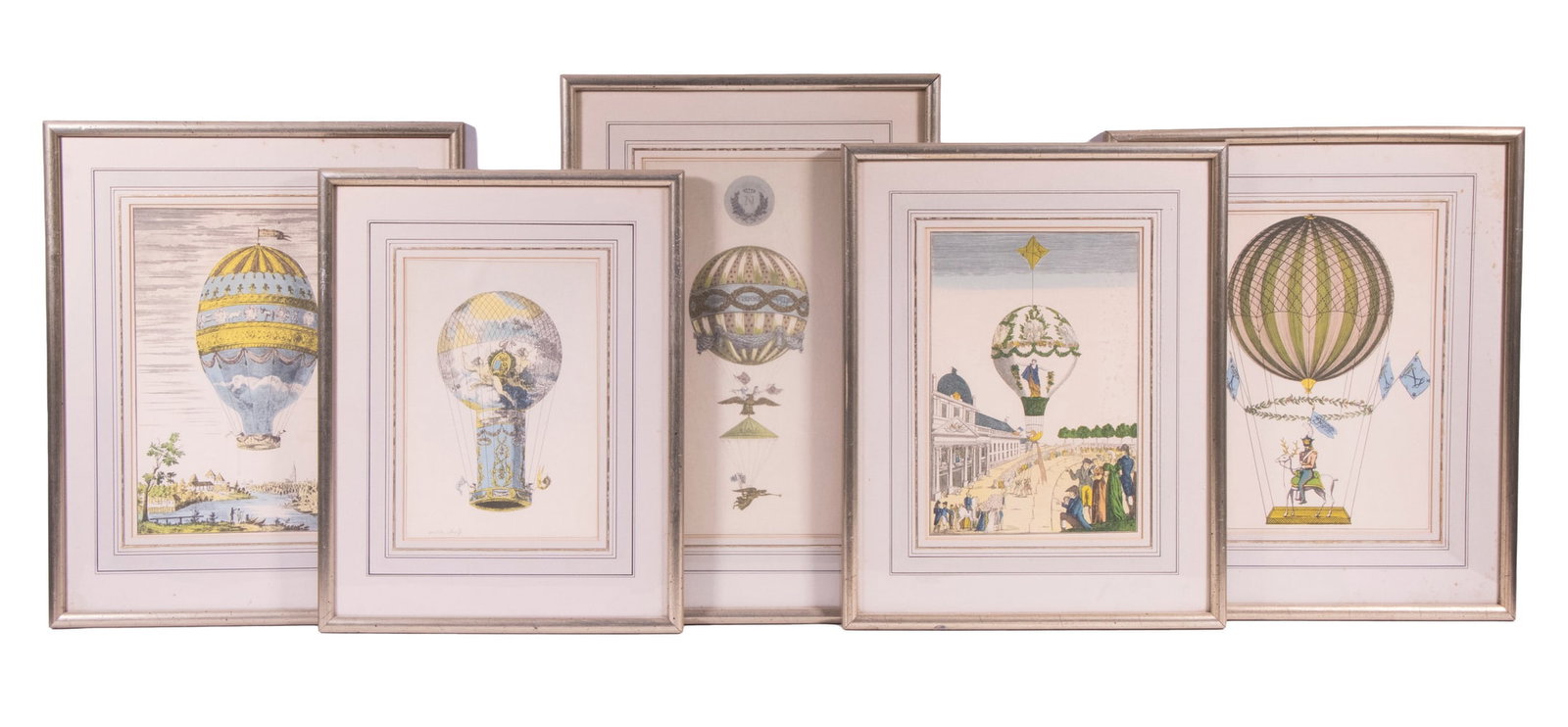 (5) REPLICA PRINTS OF 18TH C. BALLOONS: Brothers Montgolfier's balloons in France and Austria, after Voisin, photolithos, in matching silver domed stick frames, (but no two are of the same size! ) with silver ruled mats, under glass, 15 1/2