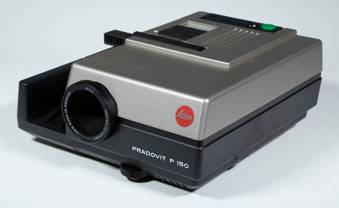 LEICA PRADOVIT P150 SLIDE PROJECTOR: Compact Automatic 35mm Side Projector, sn 412823, suitable for three types of straight slide magazines (comes with standard 36 magazine), with editor for single slide projection and slide viewer, with