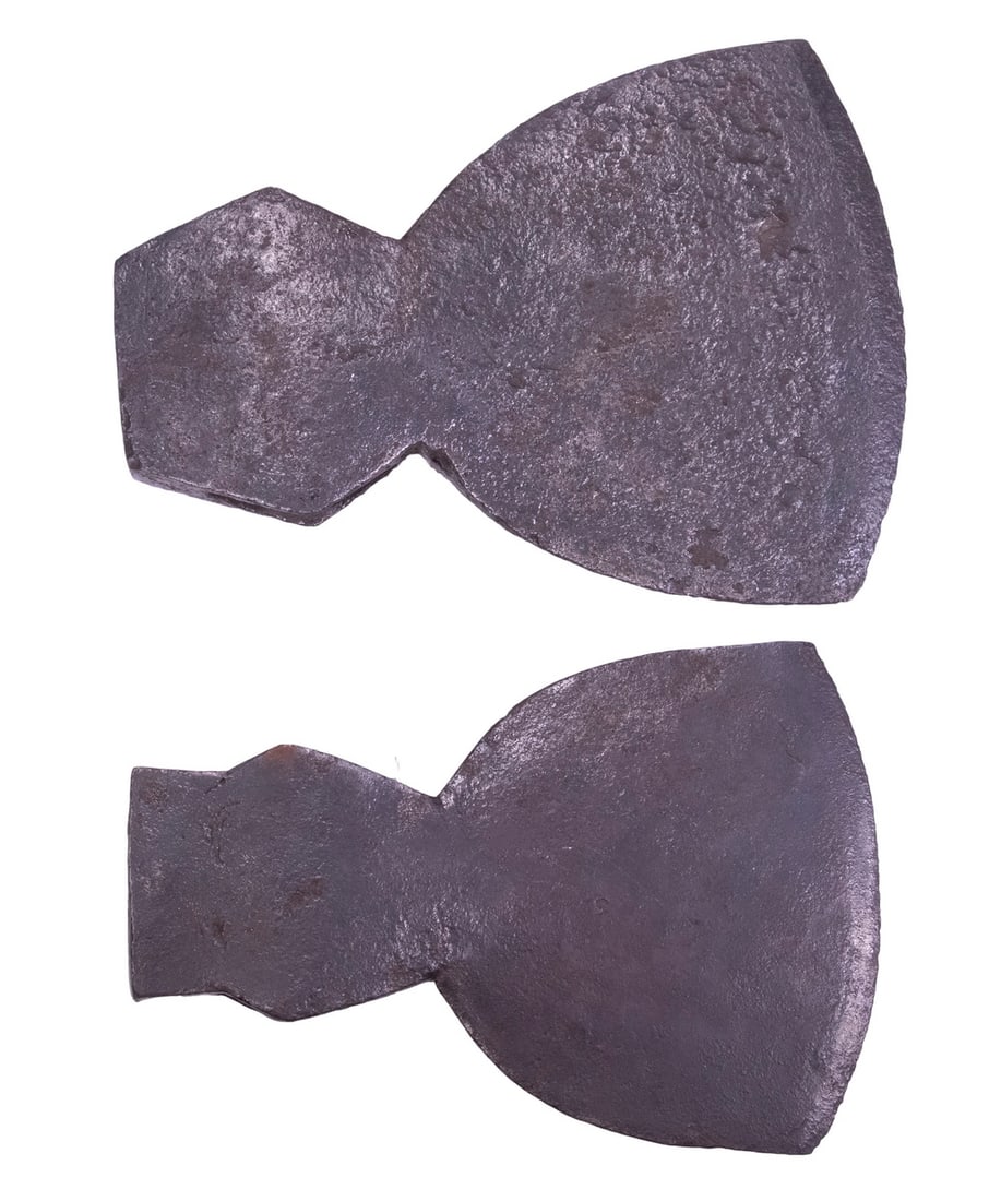 (2) COLONIAL IRON BROAD AXE HEADS, FOUND IN MAINE: Pattern Trade Pieces, circa 1750, Massachusetts Colony of Maine or Acadian Canada, blacksmith forged, with typical shallow convex edge (still sharp), having block butt and tapered oval eye. 10 1/4" x