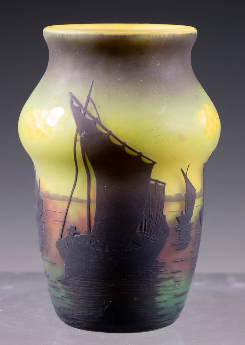 DAUM NANCY CAMEO GLASS VASE: Early 20th c. French Scenic Art Glass Vase, with acid etched harbor image of Chinese sailboats over a green to yellow to orange ground, with cameo "Daum Nancy" signature and cross of Lorraine, 5 3/4"