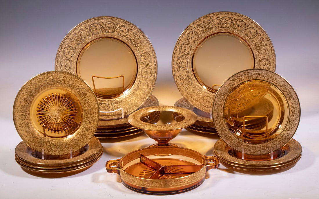 CAMBRIDGE GOLD RIMMED AMBER GLASS DISHES: (22) Piece Set of Cambridge Amber Gold Encrusted Dishes, incl: (11) Dinner plates, 10 1/2" diam.; (9) Salad plates, 8" diam.; Divided serving dish with side handles, 10 1/4" x 7 3/4"; and Footed flare