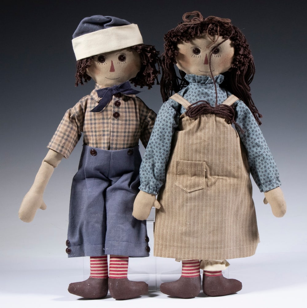 VINTAGE DOLLS: Pair of vintage cloth Raggedy Ann & Andy dolls, 15" high; surface wear and losses.From a Camden, ME Estate.