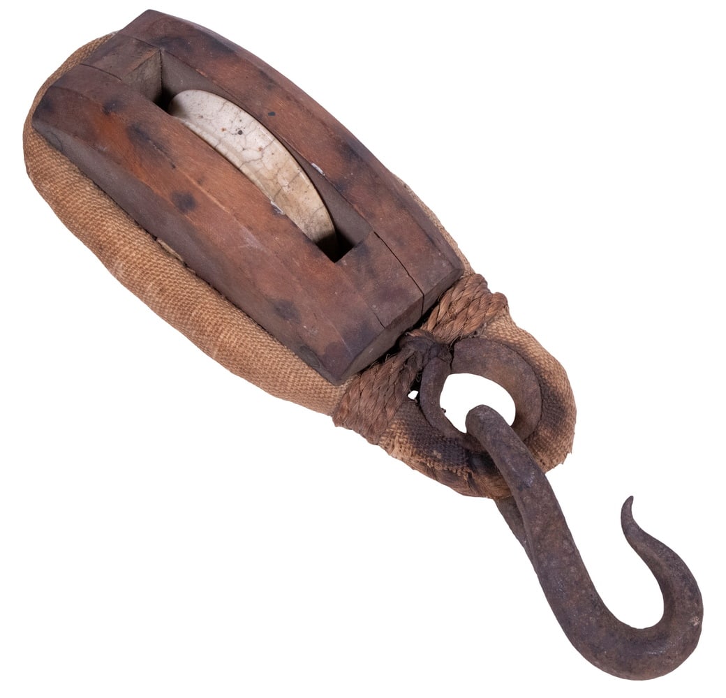 WOOD & WHALE BONE MARINE PULLEY: 19th c. Single Block Ship's Pulley, with wooden block and whale bone sheave, forged iron hook and eye, canvas wrapped strop, 10 1/2" high, 3 1/2" x 3".From a private Maine collection.
