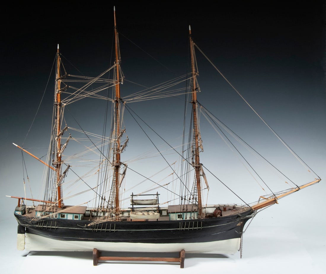 EARLY SAILING SHIP MODEL: 19th c. Carved and Painted Three-Mast Model, fully rigged, set on a wooden base, 26 1/2" high, 33" x 10".From a private Maine collection.