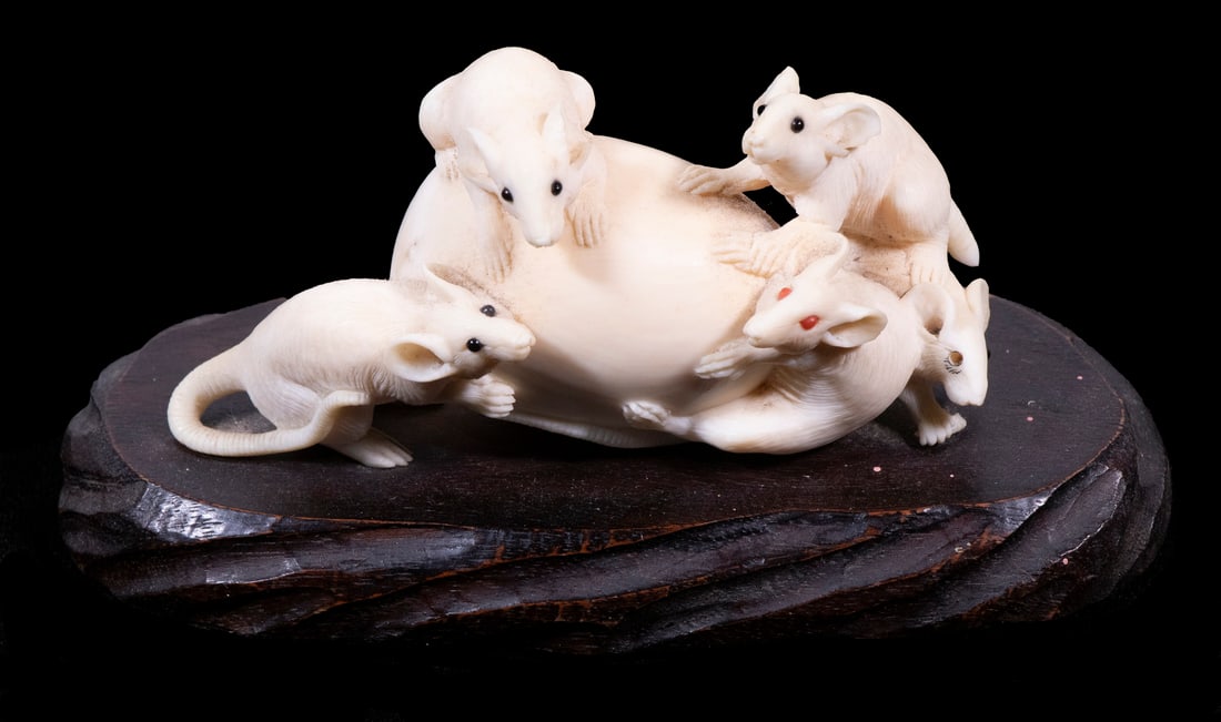 19TH C. JAPANESE IVORY OKIMONO: Meiji Figure of Five Mice with an Egg, having glass eyes, mounted on a wooden base, 4" long carving, missing one eye.