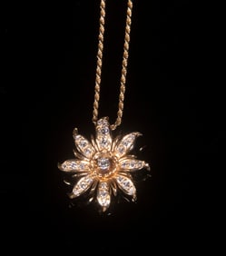 DIAMOND FLORAL FORM PENDANT ON CHAIN