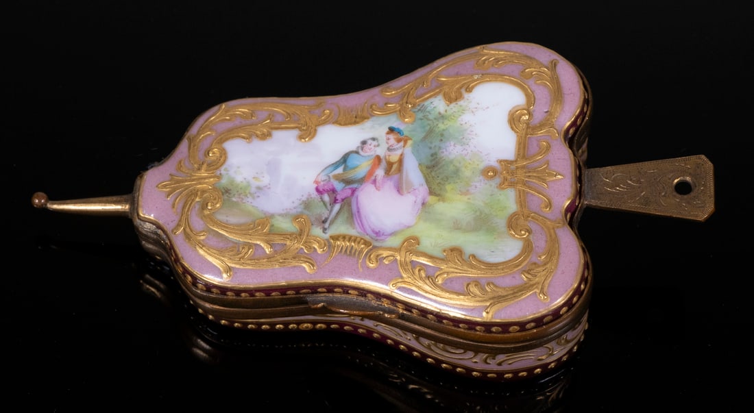 CHOISY-LE-ROI HAND PAINTED PORCELAIN BOX: Circa 1880 Bronze Mounted Hinged Pastille or Trinket Box, with the mark of French maker Choisy-le-Roi, in the form of a bellows, the lid with hand painted courting scene decoration surrounded by raise
