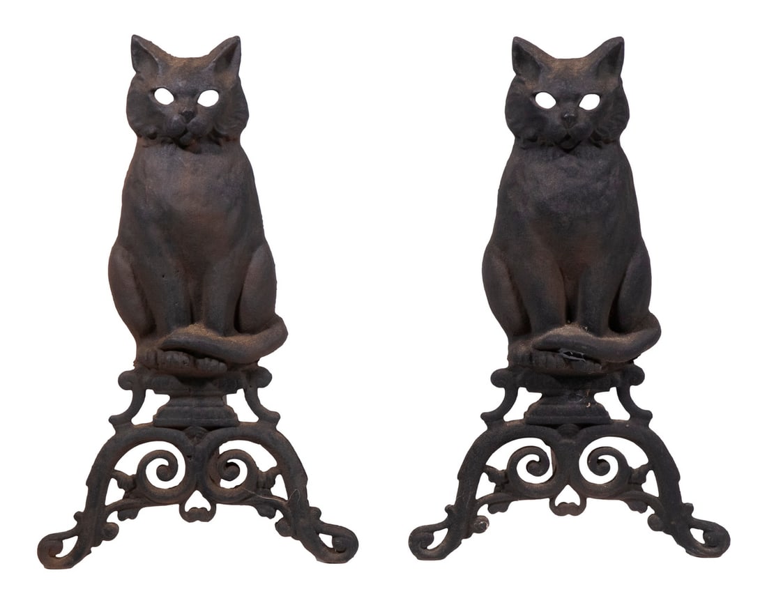 PR CAST IRON CAT ANDIRONS: Pair of 19th c. Black Seated Cat Form Andirons, atop pierced and scrolled pedestals, with attached iron log holders, 17" high, 10" x 15". Missing glass eyes.