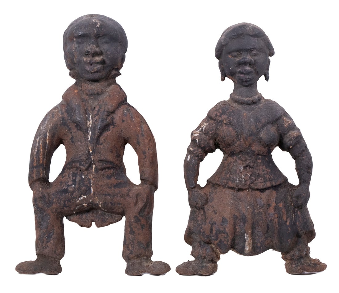 CAST IRON FIGURAL ANDIRONS: Pair of 19th c. Andirons, depicting an African-American couple, 16" high, 10" wide. Rusted surface; missing log holders.