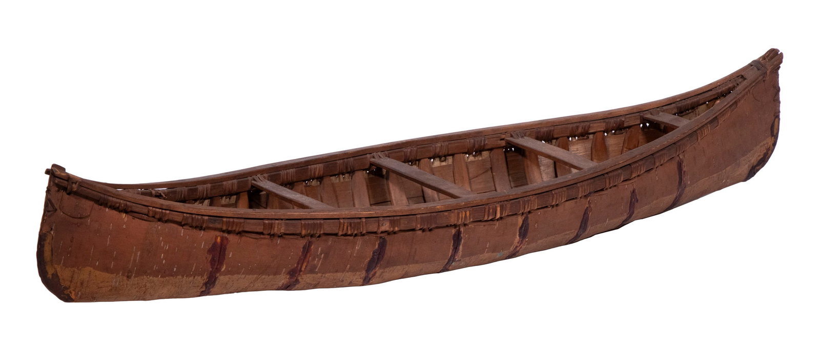 NATIVE AMERICAN MADE LARGE TOY CANOE: 19th c Birch Bark Canoe, found in Maine, probably Penobscot, using accurate materials and techniques, roughly 38" x 11" x 7 1/2".