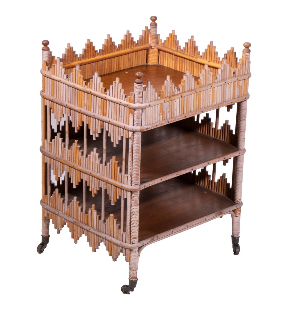 BAMBOO THREE-TIER END TABLE: Vintage Side Stand, with geometric applied bamboo sticks, having a galleried top and a total of three shelves, set on casters, 23" high, 16" x 14".