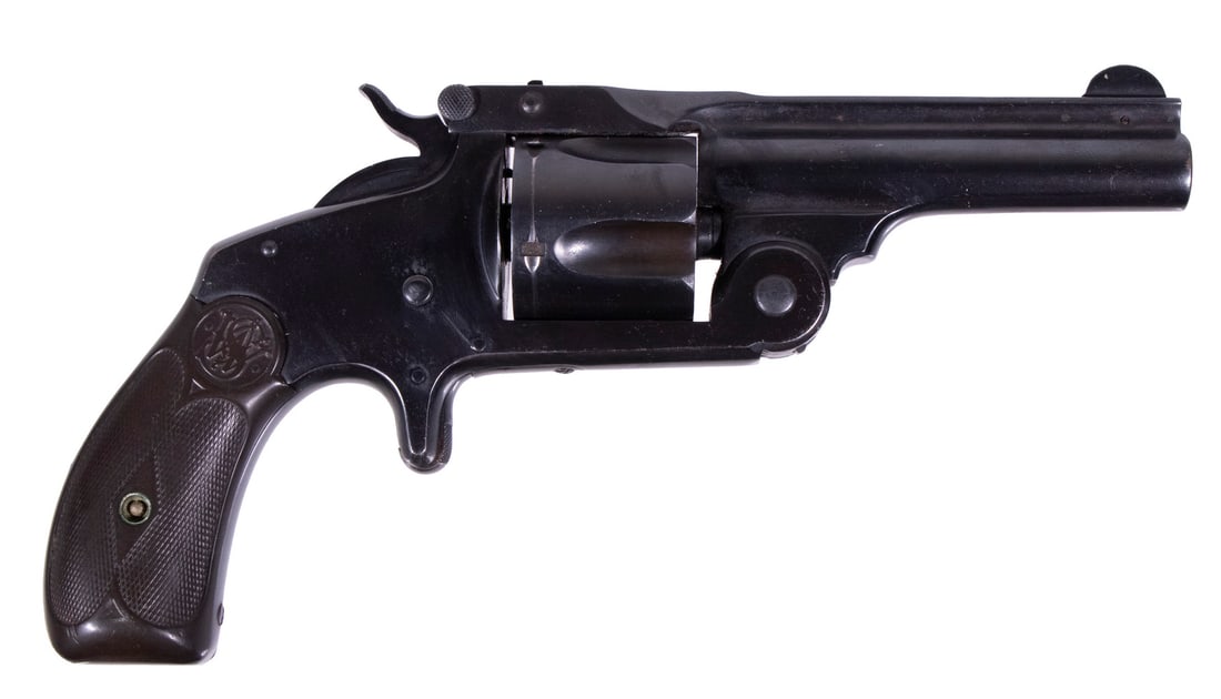 SMITH & WESSON MDL. 2 REVOLVER, .38 S&W: An offering of an excellent, early-model Smith & Wesson revolver. The firearm features a deep blued finish throughout, ribbed barrel with fixed front blade and rear V-notch, and checkered brown plasti