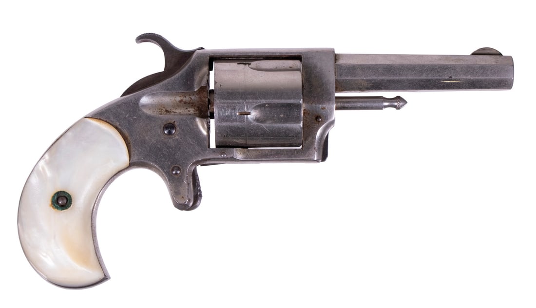 E.L. DICKINSON RANGER NO. 2 REVOLVER, .32 RF: A small single-action revolver made by E.L. Dickinson of Springfield, Massachusetts. The firearm features a nickel finish with mother of pearl grip panels, octagonal barrel, fluted cylinder, and spur 