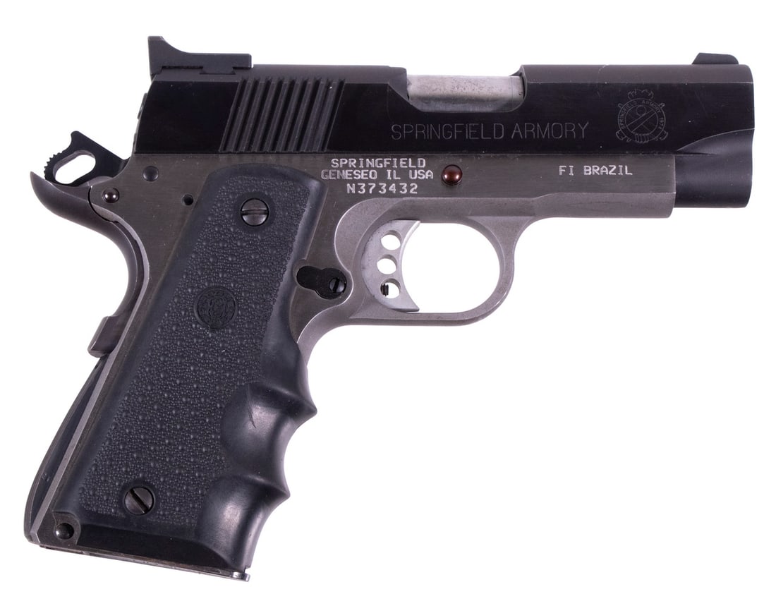 SPRINGFIELD 1911 ULTRA-COMPACT, .45 ACP: A snub-nosed 1911 made in Brazil and imported by Springfield Armory. The pistol features a two-toned finish with a stainless steel finish to the frame and a matte black finish to the slide, drift adju