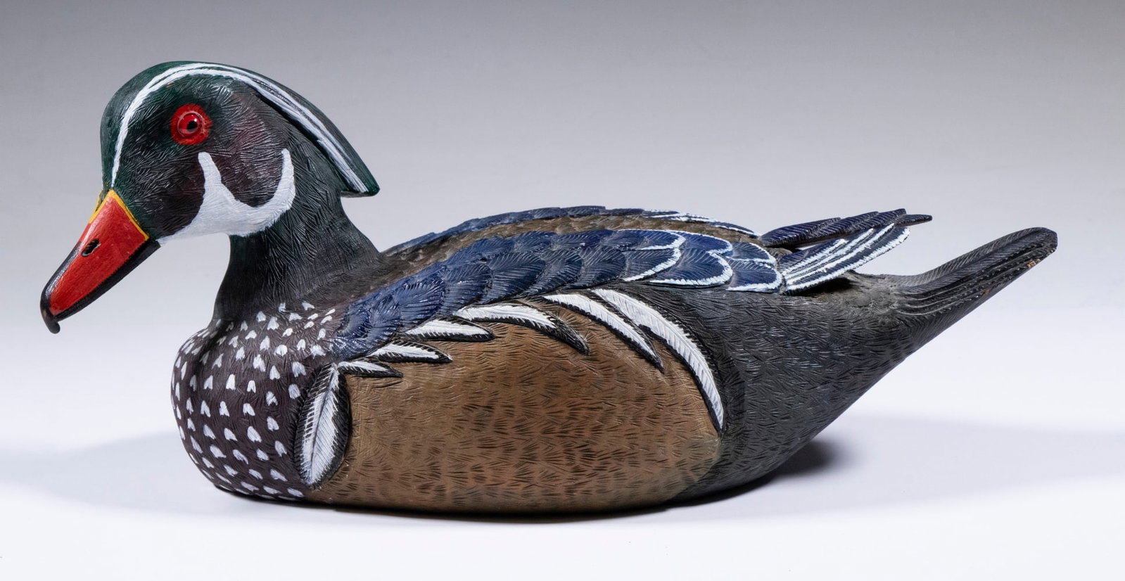 WOOD DUCK DECOY BY WARREN KINGSBURY: Carved and Painted Decoy, depicting an American Wood Duck drake, by Warren Kingsbury, Boscawen, NH, dated February 7, 1992; with glass eyes, beautifully painted with highly detailed feathers, with bra