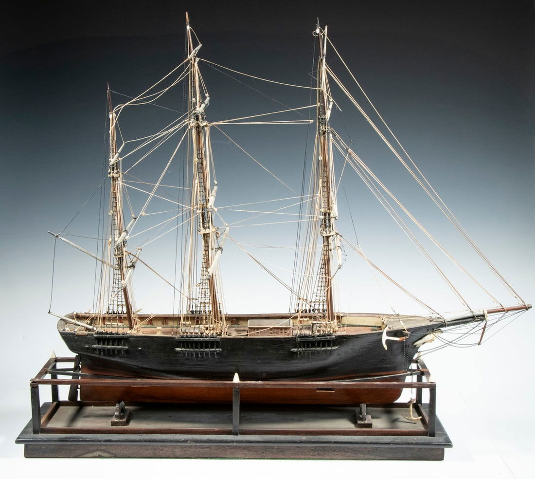 EARLY THREE-MAST SHIP MODEL: Circa 1880s Hand Crafted Model of U.S. Sailing Ship "Eagle", fully rigged, with ivory eagle figurehead and anchor, set in a wooden stand, 24 " high, 20 1/2" wide.From a private Maine collection.