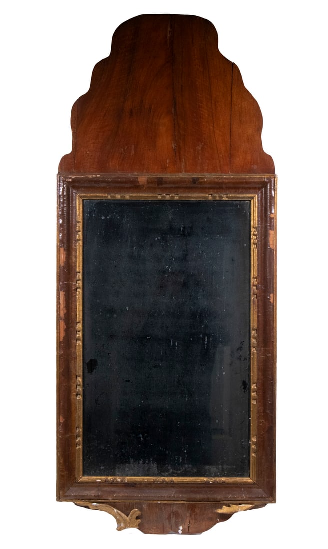 QUEEN ANNE MIRROR: 18th c. Mahogany Wall Mirror, with applied gilded decoration, molded edge frame, wood panel back, 36" x 15". Losses and shrinkage cracks.From the Estate of Bowdoin Professor William Collins Watterson.