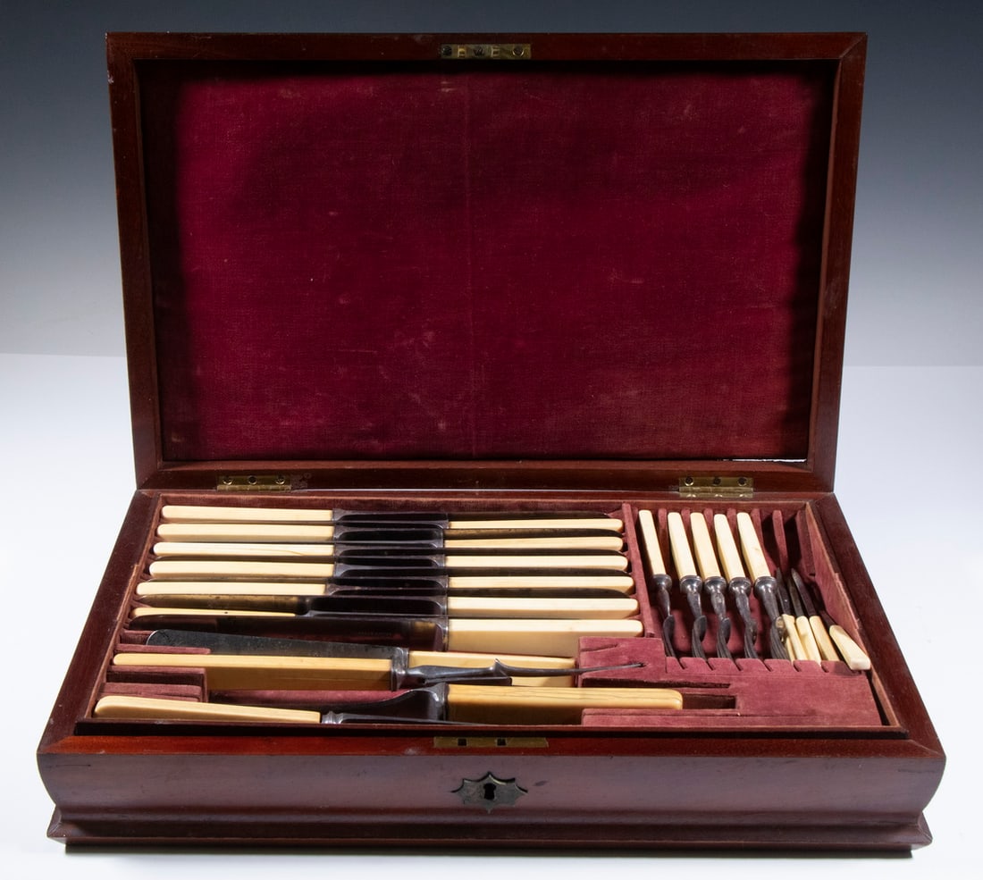 ENGLISH MAHOGANY CASED CUTLERY SET: (56) Late 19th c. Bone Handled Utensils, including (49) pieces by John Bagshaw & Sons, Liverpool - (12) Large knives, 10 1/2" long; (8) Knives, 8" long; (11) Three-tine forks, 8" long; (10) Three-tine