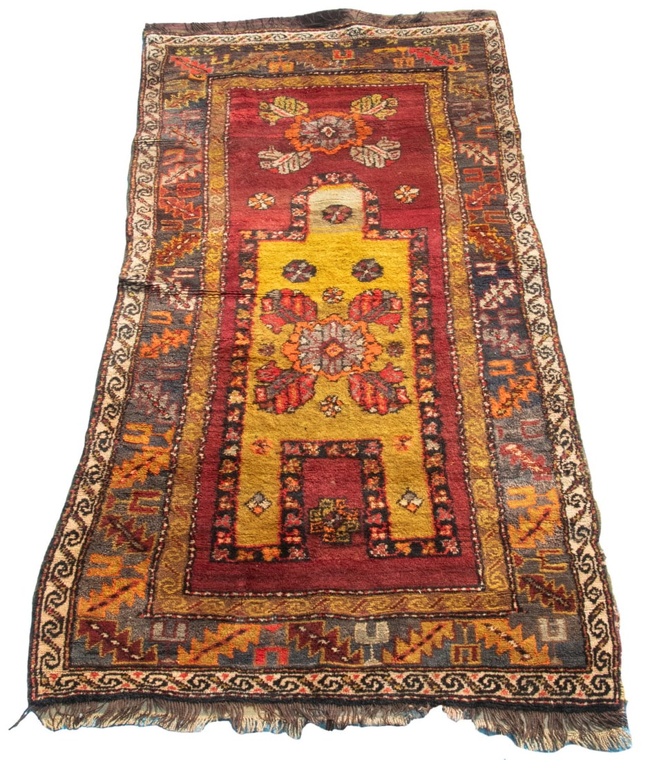 SOUTH PERSIAN PRAYER RUG (3'6" X 7'): Mid 20th C., Abrashed gold prayer mihrab covered by a rosette medallion & diamond motif. Red field, abrashed blue-green serrated leaf & wine bup border. Good condition, dye runs.