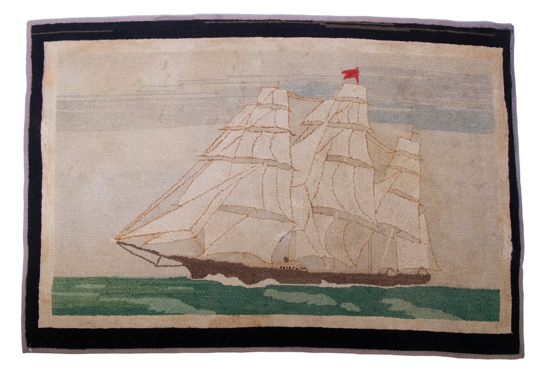 HOOKED RUG OF THREE-MAST SHIP, CIRCA 1920: Clipper Ship Underway, flying a red flag, under full sail, port side view, with integral buff and black borders, pale lavender cotton binding, 32" x 48", old repairs.
