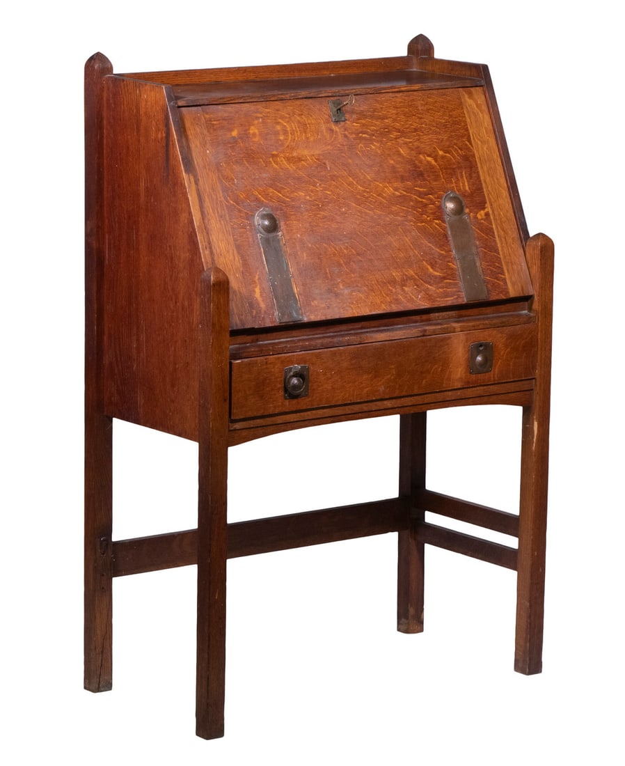 MISSION OAK FALL FRONT LADIES DESK: Circa 1910 Arts & Crafts Desk, in quartersawn oak, with pointed corner finials, hammered copper hardware (with key), interior with five pigeon holes and one drawer, single wide drawer below with drop