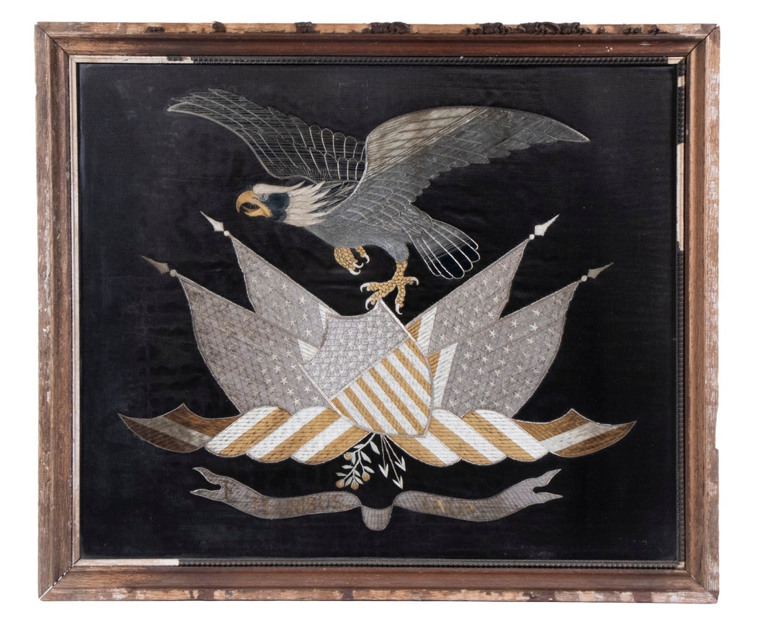 19TH C. PATRIOTIC EMBROIDERY, FRAMED: Civil War Era American Eagle over Crossed Flags and Shield, with E Pluribus Unum riband, on a black field, framed under glass 20" x 24" textile under old glass, NEEDS FRAME