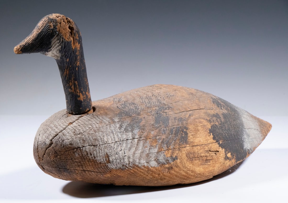 CANADA GOOSE DECOY: Wonderful Canada Goose by E. Otis Bridges of Bozman, MD (1903-1993), with appealing weathered surface; just what you would like in your collection, 9" high, 17" long.