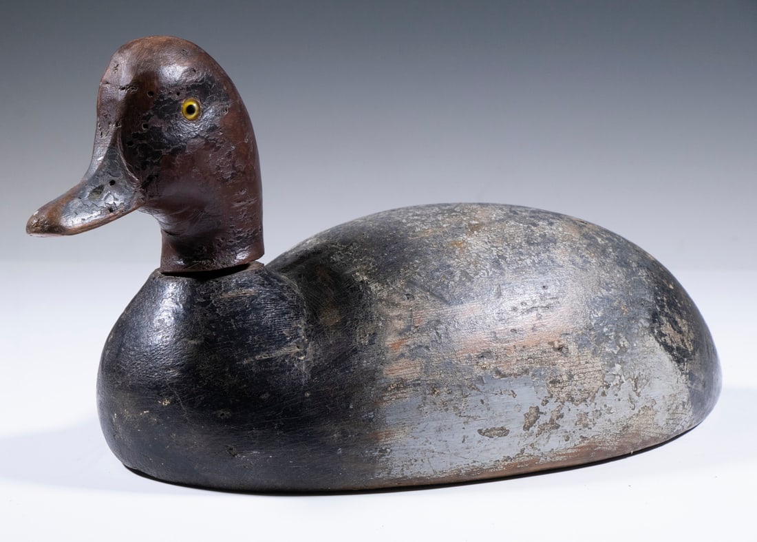 REDHEAD DUCK DECOY: Large Bob-Tail Redhead Drake from Michigan, a mix of original and in-use paint, structurally sound, 7 1/2" high, 15" long.
