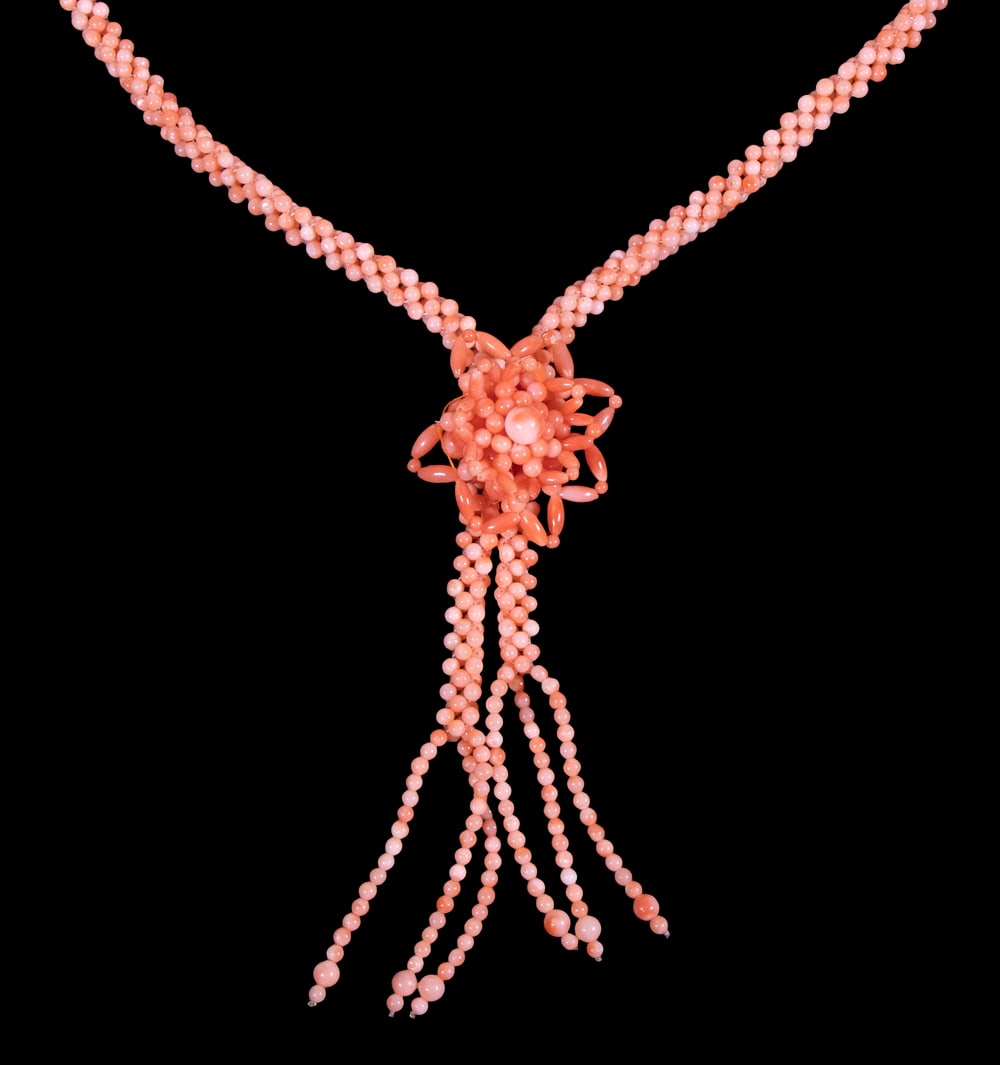 PINK CORAL BEAD NECKLACE: Woven Strand of Small Pink Coral Beads, 24" long, plus 4 1/2" central drop.