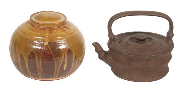 (2) JAPANESE CERAMIC VESSELS: Including: Banko ware teapot, with tall, fixed handle, bamboo design spout, incised calligraphy decoration to body, base stamped with oval maker's seal mark, 4 1/2" high, 6 1/4" wide; and Lidded terra