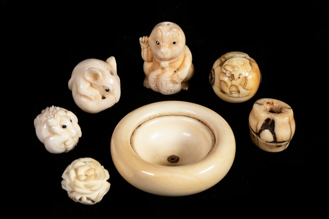 (7) 19TH C. JAPANESE IVORY OJIME: Including five figural: a Cat, a Horse, a Mouse, a Dog and a Blossom, PLUS a Barrel and a large dished Button, 1/2" to 1 1/2".