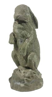 RESIN RABBIT GARDEN FIGURE: Vintage Outdoor Statue, depicting a standing rabbit. Surface wear.From the private collection of Sally Jessy RaphaelConverted dimensions: 19 x 7 x 8 in. (48.3 x 17.8 x 20.3 cm.)