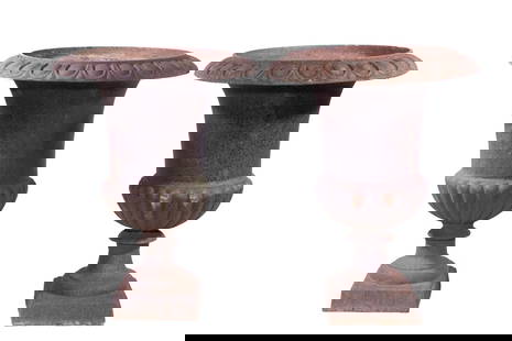 PR CAST IRON GARDEN URNS: Pair of Vintage Neoclassical Style Iron Planters, each with flared rim, lobed base, set on a square foot. Surface rust.From the private collection of Sally Jessy RaphaelConverted dimensions: 24 x 18