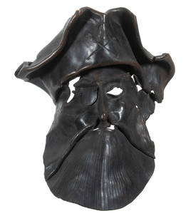 19TH C. VENETIAN LEATHER MASK: Italian Festival Mask of a Bearded Buccaneer with tricorn hat having engraved skull & cross bones, molded from a single piece of leather. Converted dimensions: 10 3/4 x 9 x 6 3/4 in. (27.3 x 22.9 x 17