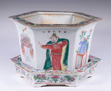 CHINESE FAMILLE ROSE WUSHUANGPU PORCELAIN JARDINIERE: (2) Piece Famille Rose Hexagonal Planter with Underplate, each side with calligraphy verse or figural decoration. Converted dimensions: 7 x 11 in. (17.8 x 27.9 cm.)