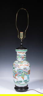 CHINESE FAMILLE VERTE PORCELAIN VASE, AS A LAMP: 19th c. or earlier Rouleau Vase, with continuous painted decoration of warriors, mounted as a table lamp with wooden base, single socket fixture with harp and finial, vase only: 13 1/2" high (overall