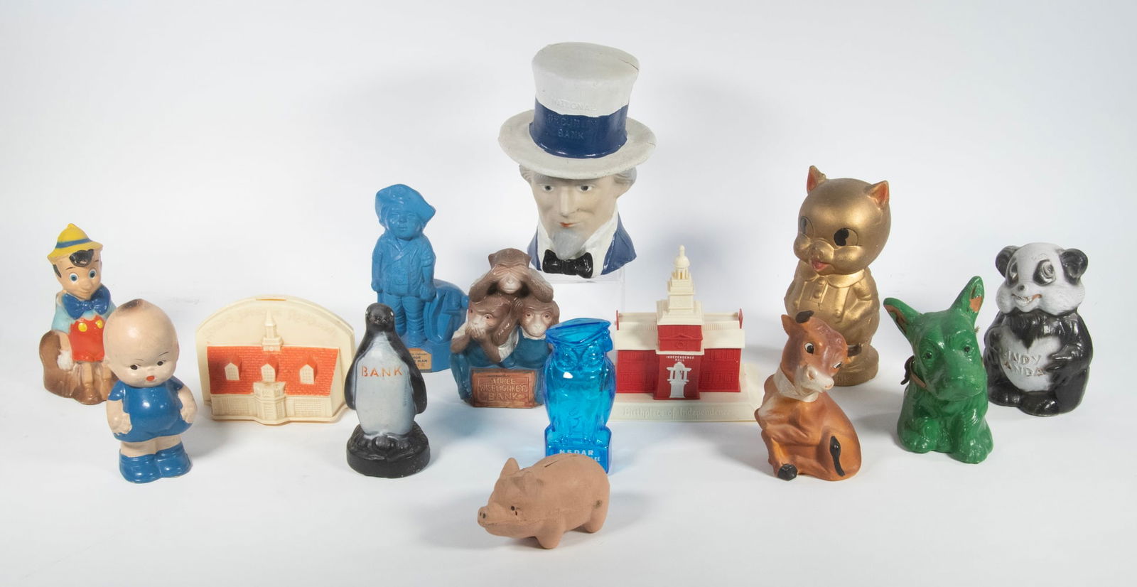 (14) VINTAGE COMPOSITION & PLASTIC COIN BANKS (1 of 1)