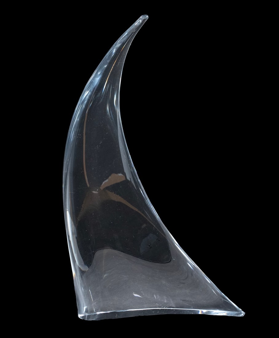 MARCOLIN SWEDEN ART GLASS SCULPTURE: Clear Crystal Modernist Design Sculpture, 1980s, depicting a curved wing or sail, incised "Marcolin Sweden, C.26 - HO" on base edge. Converted dimensions: 14 1/2 x 8 in. (36.8 x 20.3 cm.)