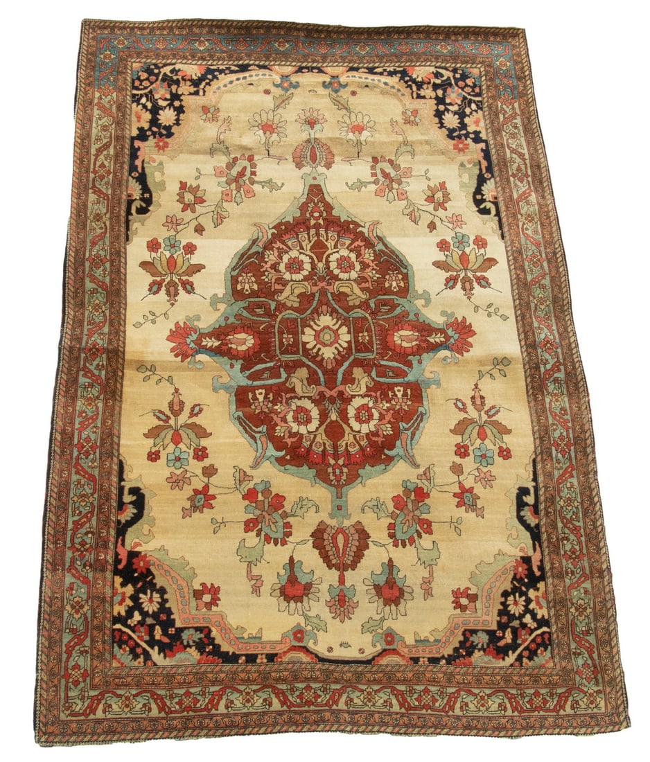FEREGHAN-SAROUK CARPET, 4'3"X6'6": West Persian made, late 19th C., a notched & hooked oval medallion in red, blue-green, gold, & ivory on the soft heavily abrashed tan-gold field, midnight blue spandrels, abrashed sky blue vine & palm