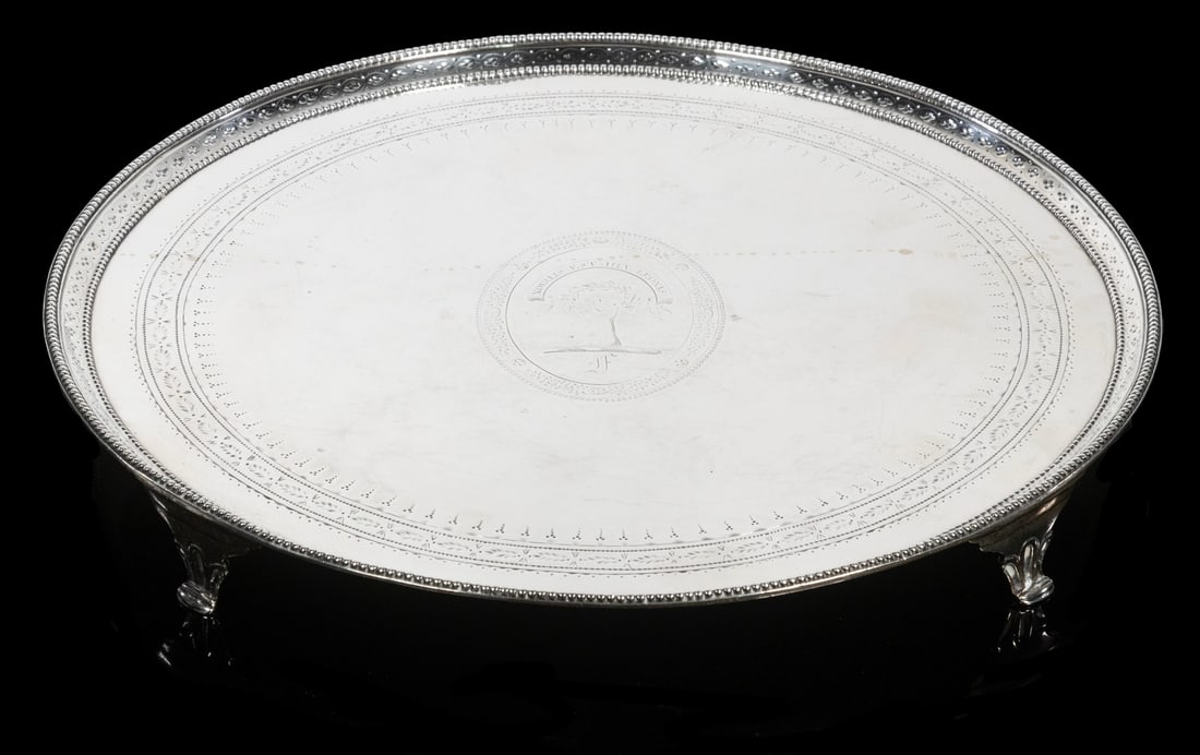 GEORGE III PERIOD STERLING SALVER BY JOHN HUTSON: English Sterling Silver Footed Tray, London 1783 by silversmith John Hutson, the top surface with engraved crest of the Ross family - hand grasping laurel wreath and motto: Nobilis est fra leonis (the
