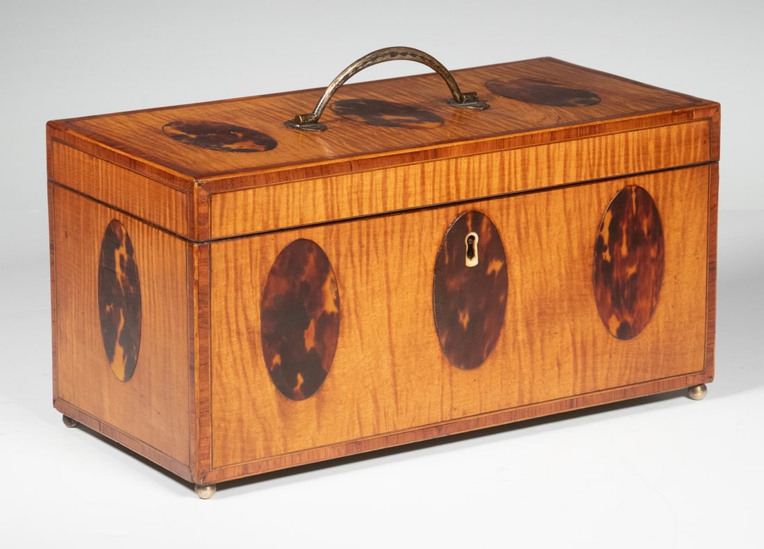 INLAID SATINWOOD TEA CADDY: 19th c. Triple Compartment Tea Box, in satinwood with inlaid oval tortoiseshell panels and crossbanded edges, brass top handle and ivory escutcheon (with key), interior with two oval hinged lidded tea